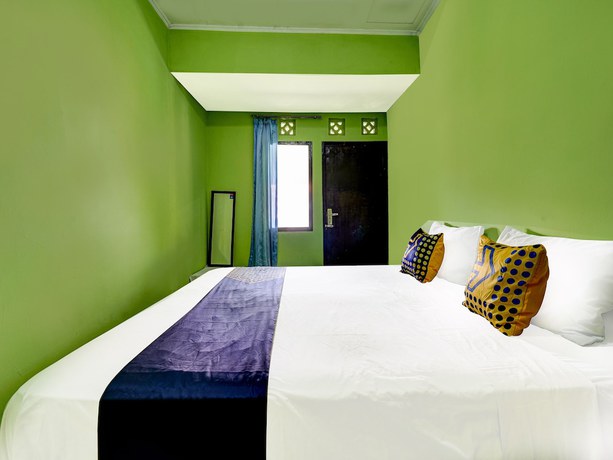 Imagen de la habitación del Hotel Oyo 91116 Pelangi Residence Syariah. Foto 6