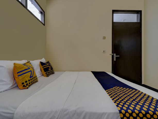 Imagen de la habitación del Hotel Oyo 91116 Pelangi Residence Syariah. Foto 7