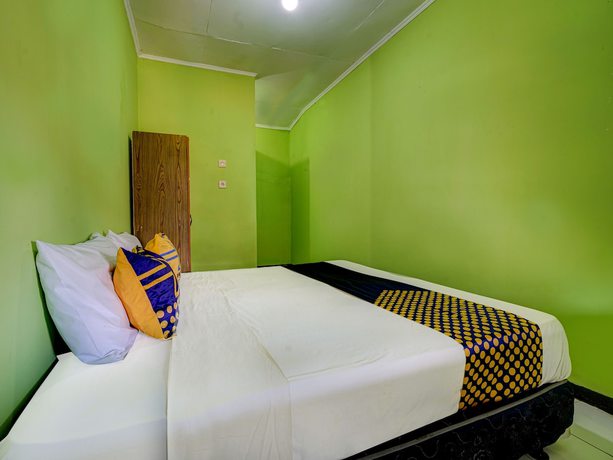 Imagen de la habitación del Hotel Oyo 91116 Pelangi Residence Syariah. Foto 8