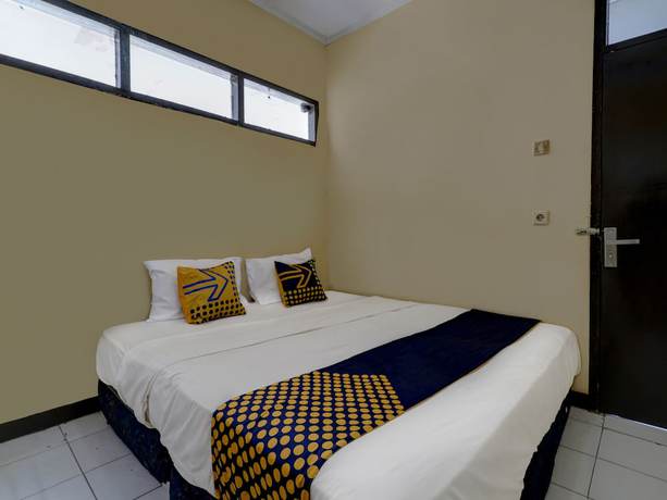 Imagen de la habitación del Hotel Oyo 91116 Pelangi Residence Syariah. Foto 9