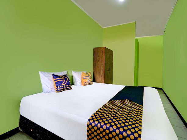 Imagen de la habitación del Hotel Oyo 91116 Pelangi Residence Syariah. Foto 10