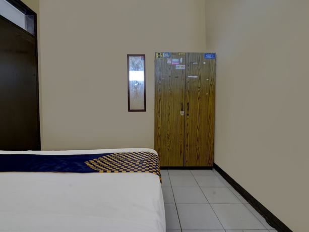 Imagen de la habitación del Hotel Oyo 91116 Pelangi Residence Syariah. Foto 12