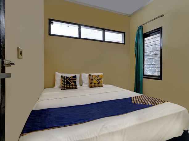 Imagen de la habitación del Hotel Oyo 91116 Pelangi Residence Syariah. Foto 15