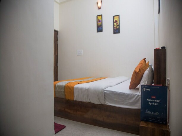 Imagen de la habitación del Hotel Oyo 9123 Baghban Residency. Foto 19