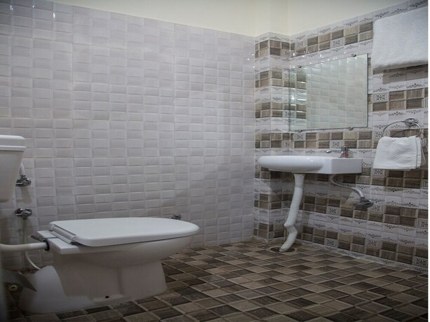 Imagen de la habitación del Hotel Oyo 9123 Baghban Residency. Foto 26