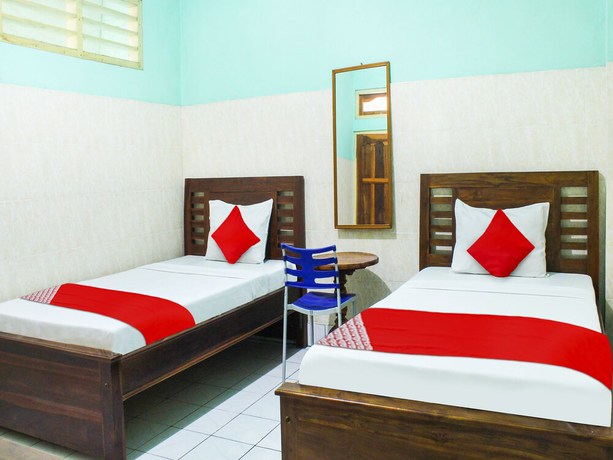 Imagen de la habitación del Hotel Oyo 91396 Laguna. Foto 2