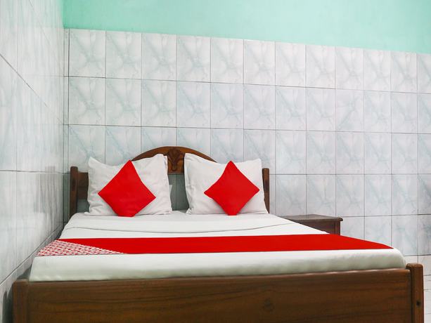 Imagen de la habitación del Hotel Oyo 91396 Laguna. Foto 13