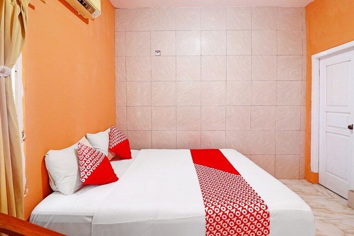 Imagen de la habitación del Hotel Oyo 91408 Kas Residence Syariah. Foto 6