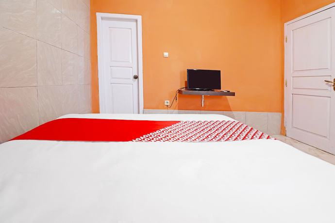 Imagen de la habitación del Hotel Oyo 91408 Kas Residence Syariah. Foto 8