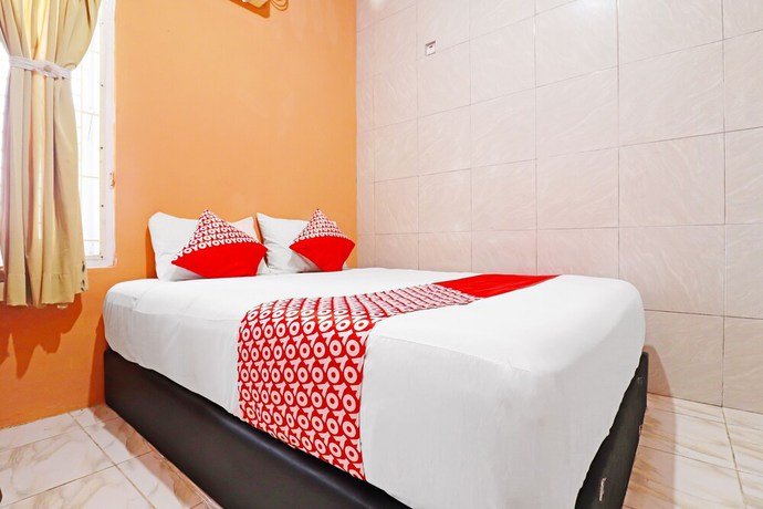 Imagen de la habitación del Hotel Oyo 91408 Kas Residence Syariah. Foto 13