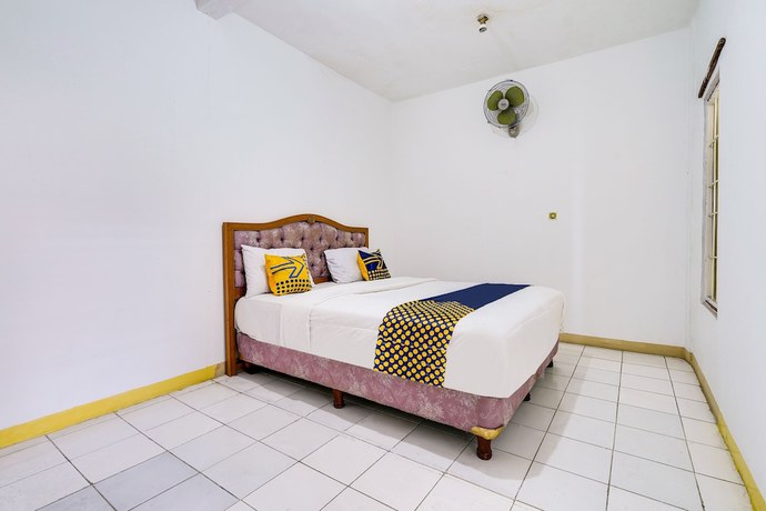 Imagen de la habitación del Hotel Oyo 91546 Dewi Sudirman Homestay. Foto 1