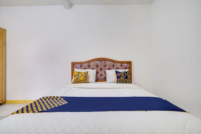 Imagen de la habitación del Hotel Oyo 91546 Dewi Sudirman Homestay. Foto 2
