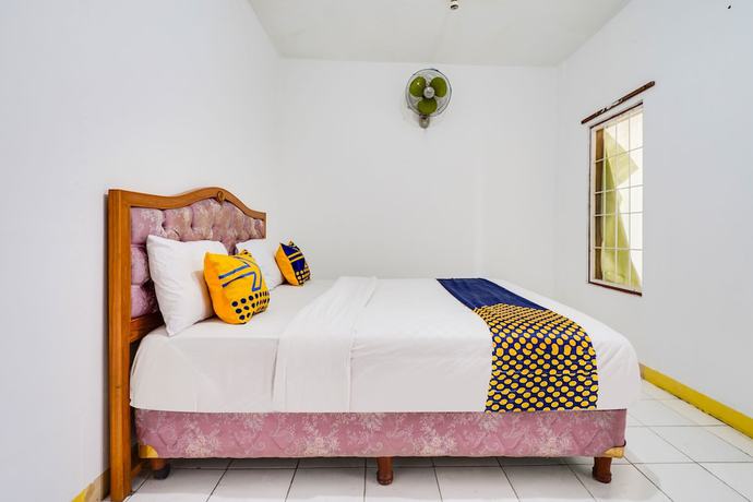 Imagen de la habitación del Hotel Oyo 91546 Dewi Sudirman Homestay. Foto 5
