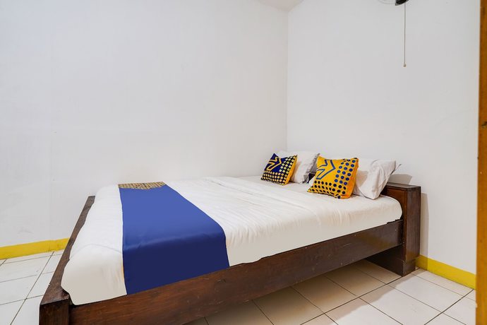 Imagen de la habitación del Hotel Oyo 91546 Dewi Sudirman Homestay. Foto 6