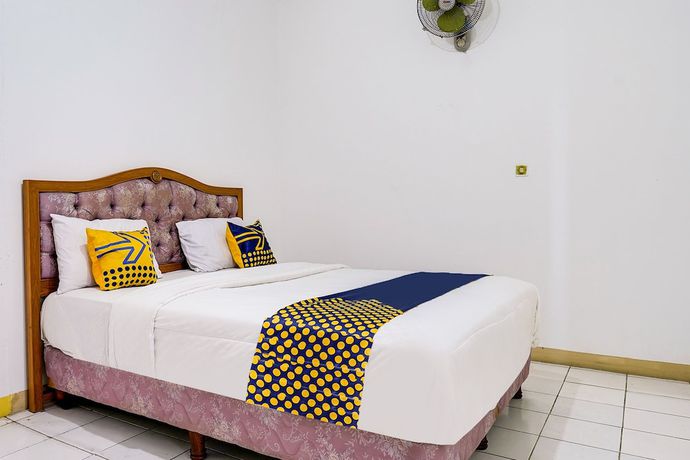 Imagen de la habitación del Hotel Oyo 91546 Dewi Sudirman Homestay. Foto 7