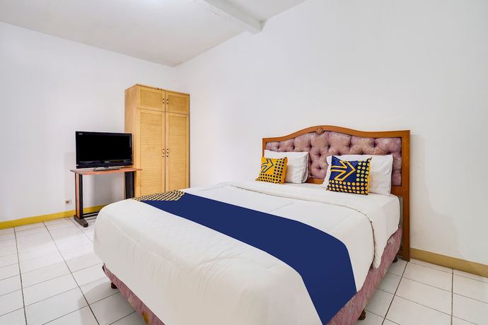 Imagen de la habitación del Hotel Oyo 91546 Dewi Sudirman Homestay. Foto 10