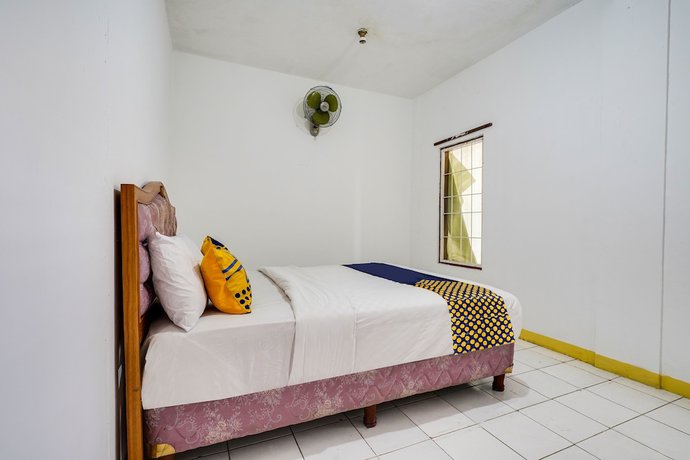 Imagen de la habitación del Hotel Oyo 91546 Dewi Sudirman Homestay. Foto 11