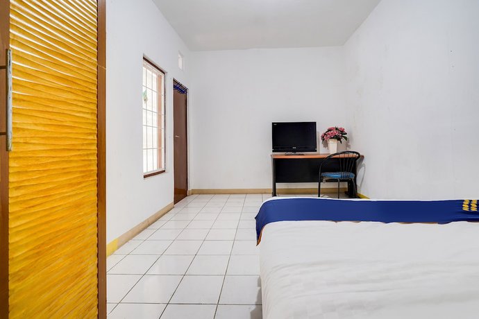 Imagen de la habitación del Hotel Oyo 91546 Dewi Sudirman Homestay. Foto 12