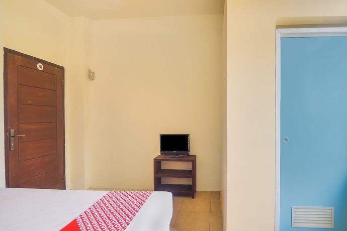 Imagen de la habitación del Hotel Oyo 91755 Priska Kost Dan Homestay. Foto 5