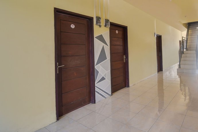 Imagen de los interiores del Hotel Oyo 91755 Priska Kost Dan Homestay. Foto 13