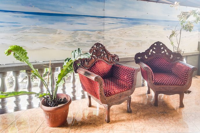 Imagen de los interiores del Hotel Oyo 91755 Priska Kost Dan Homestay. Foto 14