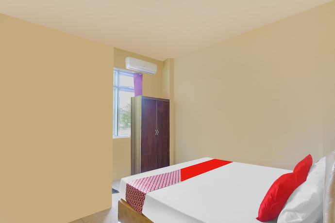 Imagen de la habitación del Hotel Oyo 91755 Priska Kost Dan Homestay. Foto 7