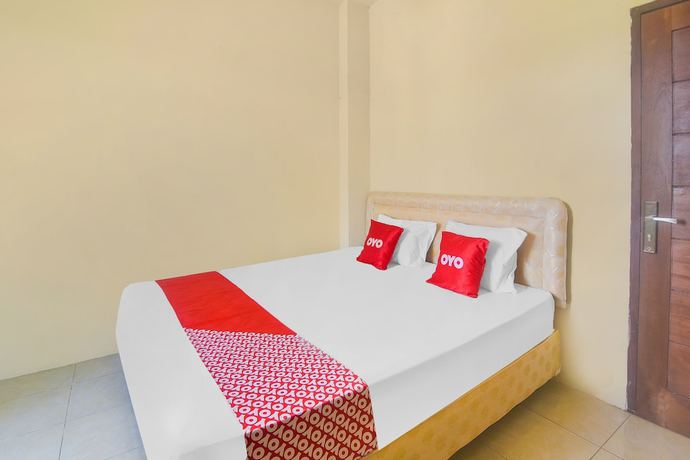 Imagen de la habitación del Hotel Oyo 91755 Priska Kost Dan Homestay. Foto 9