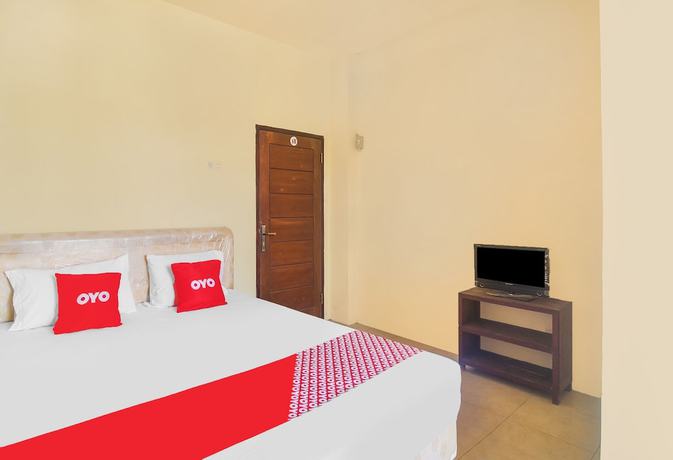 Imagen de la habitación del Hotel Oyo 91755 Priska Kost Dan Homestay. Foto 10