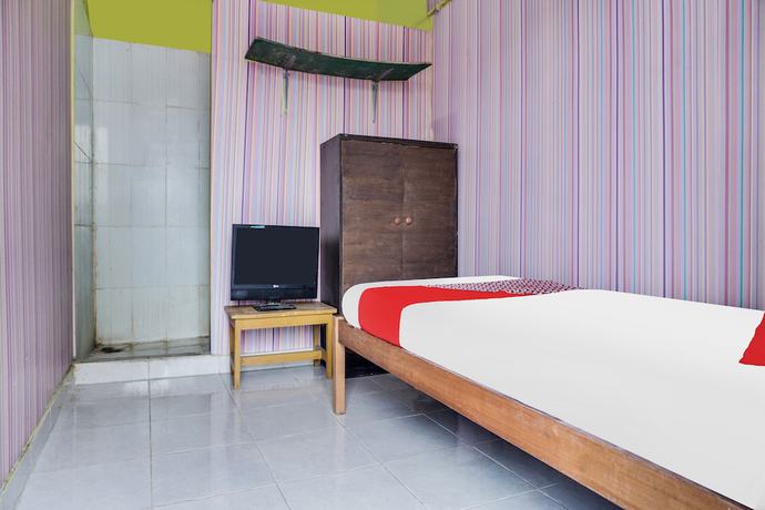Imagen de la habitación del Hotel Oyo 92110 Christine Home Stay Syariah. Foto 9