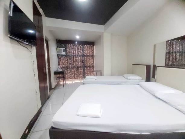 Imagen de la habitación del Hotel Oyo 924 Cosmo Espana Near Ust. Foto 2