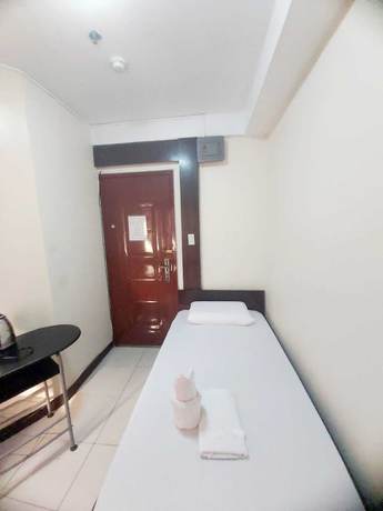 Imagen de la habitación del Hotel Oyo 924 Cosmo Espana Near Ust. Foto 4