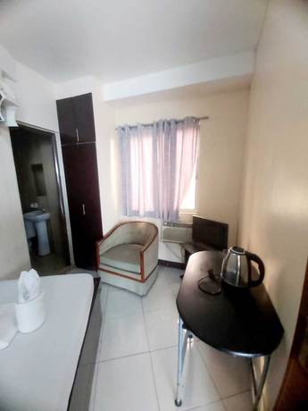 Imagen de la habitación del Hotel Oyo 924 Cosmo Espana Near Ust. Foto 5