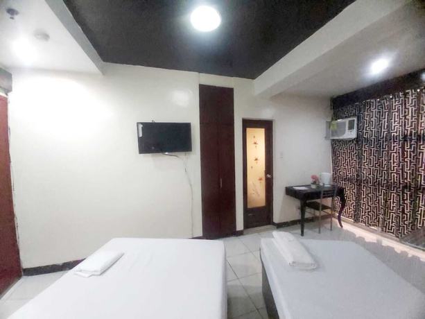 Imagen de la habitación del Hotel Oyo 924 Cosmo Espana Near Ust. Foto 6