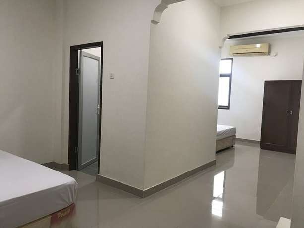Imagen de la habitación del Hotel Oyo 92468 Roemah Djatinegara. Foto 6