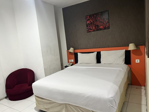 Imagen de la habitación del Hotel Oyo 92472 Tri Homestay. Foto 10