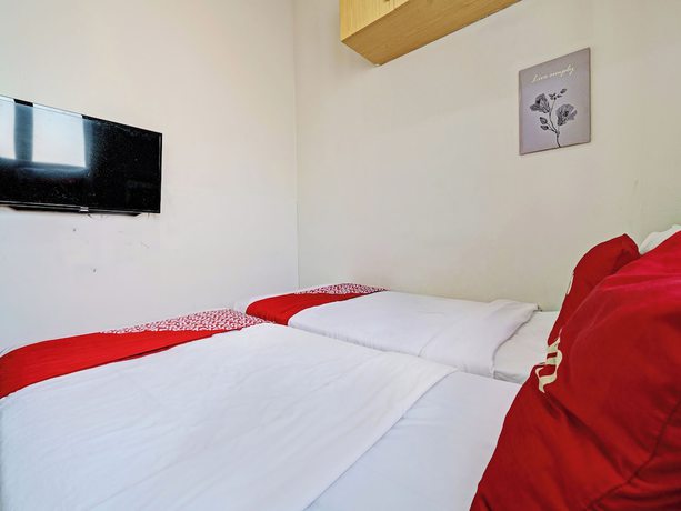 Imagen de la habitación del Hotel Oyo 92768 Flagship Exclusive Colombus Near Stasiun Karawang. Foto 6