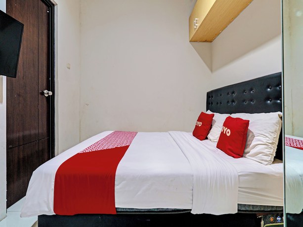 Imagen de la habitación del Hotel Oyo 92768 Flagship Exclusive Colombus Near Stasiun Karawang. Foto 10