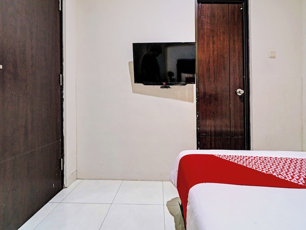 Imagen de la habitación del Hotel Oyo 92768 Flagship Exclusive Colombus Near Stasiun Karawang. Foto 14