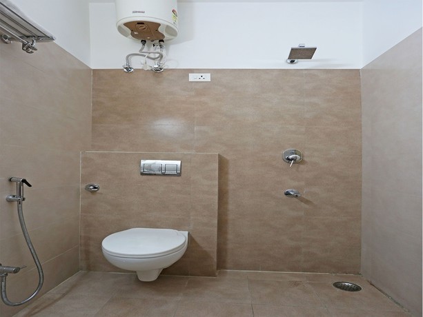 Imagen de la habitación del Hotel Oyo 9304 Swastika. Foto 14