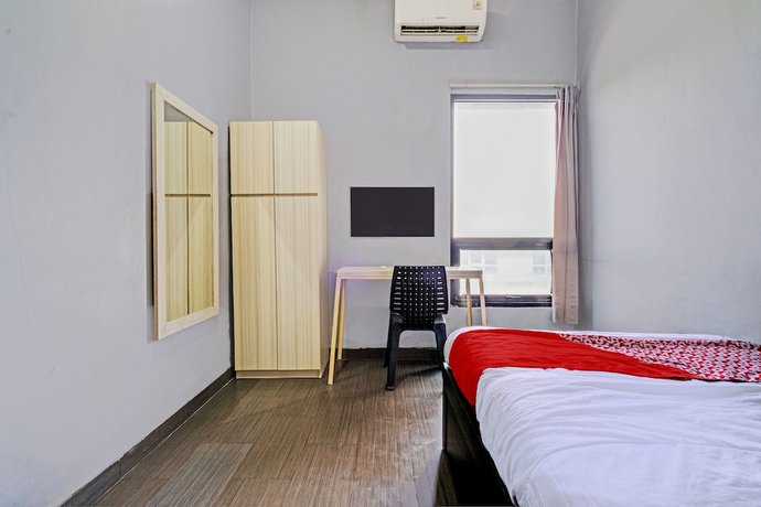 Imagen de la habitación del Hotel Oyo 93328 Graha Citra Syariah. Foto 2
