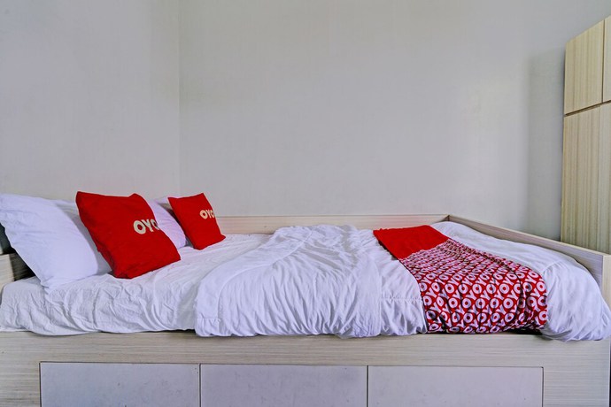 Imagen de la habitación del Hotel Oyo 93328 Graha Citra Syariah. Foto 4