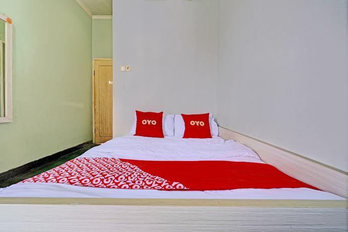 Imagen de la habitación del Hotel Oyo 93328 Graha Citra Syariah. Foto 10