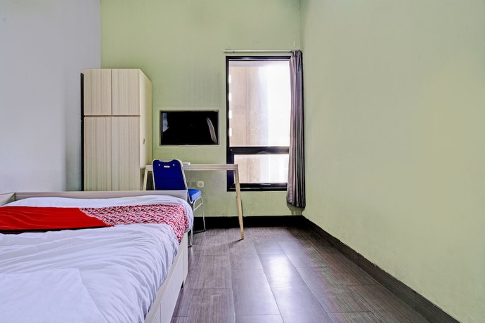 Imagen de la habitación del Hotel Oyo 93328 Graha Citra Syariah. Foto 12