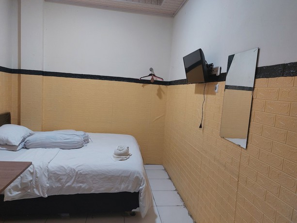 Imagen de la habitación del Hotel Oyo 93332 Kharis Home Stay. Foto 3