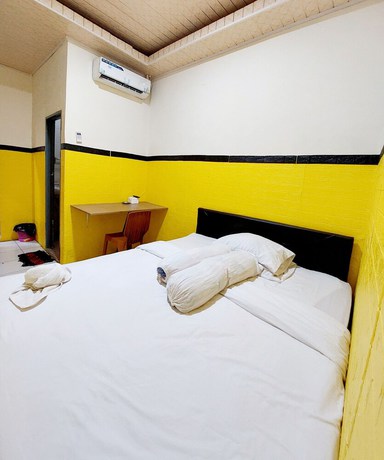 Imagen de la habitación del Hotel Oyo 93332 Kharis Home Stay. Foto 7