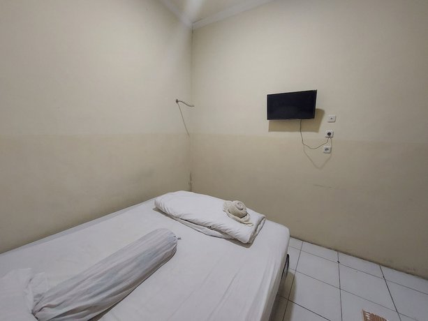 Imagen de la habitación del Hotel Oyo 93332 Kharis Home Stay. Foto 9