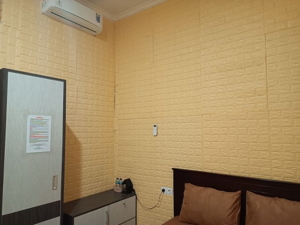 Imagen de la habitación del Hotel Oyo 93333 Rama Home Stay. Foto 2