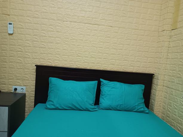 Imagen de la habitación del Hotel Oyo 93333 Rama Home Stay. Foto 5