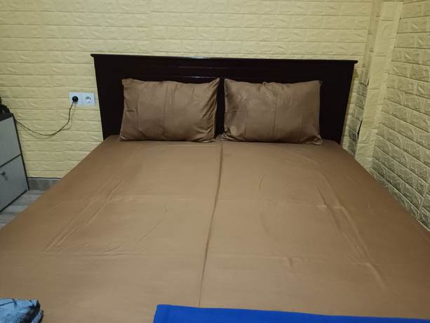 Imagen de la habitación del Hotel Oyo 93333 Rama Home Stay. Foto 10