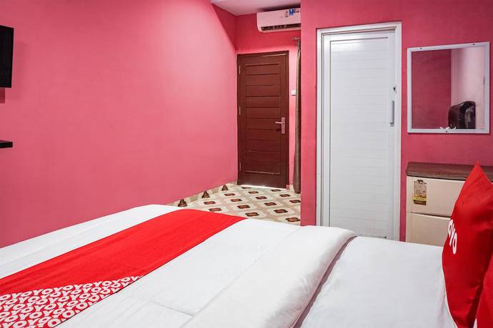 Imagen de la habitación del Hotel Oyo 93342 Yasmine Guesthouse Syariah. Foto 8